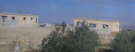 Jordan home with rebar sticking out the roof.